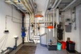 Heizungsraum Ansicht 1 - Modernisiertes Einfamilienhaus mit ELW für 2 Generationen & exklusivem Pool!