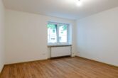 Wohnzimmer (Ansicht 3) - Top gepflegte 3-Zi.-Wohnung zum Wohlfühlen!