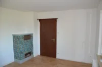 Esszimmer mit Kachelofen