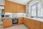 Küche (Ansicht 1) - Top gepflegte 3-Zi.-EG-Wohnung mit Südgarten & TG-Stellplatz!